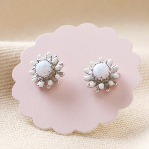 Opal and Enamel Stud Earrings in Silver in Packaging Against Neutral Coloured Fabric
