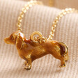 Sausage Dog Enamel Pendant Necklace in Gold on Neutral Fabric