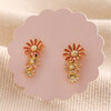 Triple Enamel Flower Stud Earrings in Gold on Pink Card