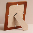 Back of Wooden Bee Photo Frame on Neutral Background