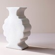 Ceramic Art Deco Scalloped Edge Vase Against Pink Background