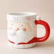 Ceramic Father Christmas Mug on Cream Background
