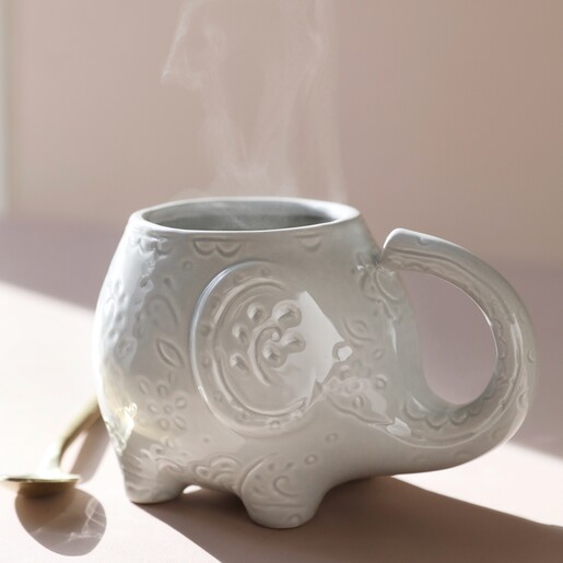 Ceramic Paisley Elephant Mug Filled With a Steamy Hot Drink