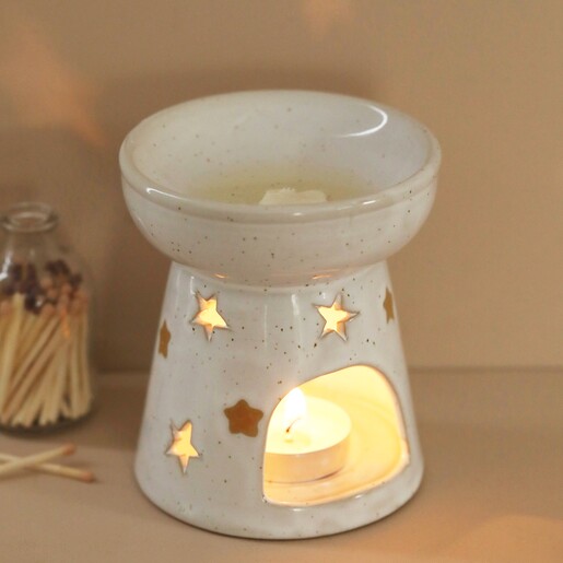 Ceramic Starry Wax Melt Burner Lit Up Ceramic Starry Wax Melt Burner in Darkened Room