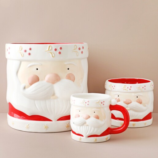 Large Ceramic Father Christmas Planter Next to Smaller Version and Father Christmas Mug