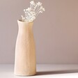 Peach Textured Ceramic Bud Vase with White Flowers Inside
