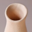 Close Up of Spout from Peach Textured Ceramic Bud Vase