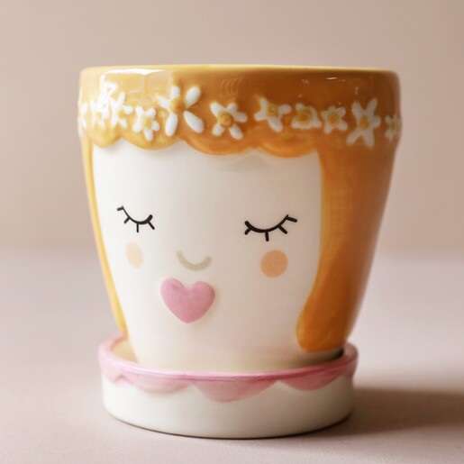 Pink Face Ceramic Planter and Tray Against Pink Background