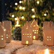 Rustic Ceramic House LED Decoration in a Festive Display