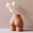 Back of Small Porcelain Body Vase with Bunny Tails 