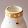 Close Up of Opening of Sun and Moon Face Ceramic Posy Vase