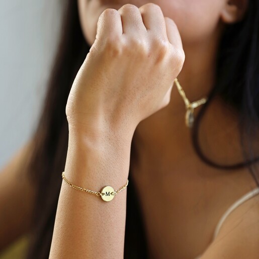 Personalised Initial Disc and Figaro Chain Bracelet on Model