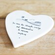 East of India Strength Quote Porcelain Heart Coaster on Wooden Surface