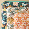 Close Up of Floral Dinosaur Cotton Pouch With Other Patterns