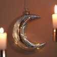 Close Up of Hanging Crackled Silver Glass LED Moon Light