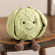 Jellycat Amuseable Brussels Sprout Soft Toy on Wooden Chair