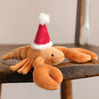 Jellycat Celebration Crustacean Lobster Soft Toy on Wooden Chair