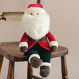 Jellycat Medium Jolly Santa Soft Toy on Wooden Chair