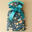 Midnight Floral Mini Hot Water Bottle on Neutral Background