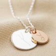 Close Up of Silver Personalised Family Constellation Disc Charm Necklace With Large Silver Disc and Small Rose Gold Disc