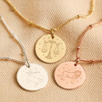 Personalised Satellite Chain Zodiac Pendant Necklace in Silver, Gold, and Rose Gold on Beige Fabric