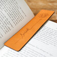 Personalised Name & Birth Flower Leather Bookmark Tucked Into Book Pages