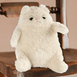 Jellycat Amore Cat Cream Small Soft Toy Sat on Wooden Chair with Natural Coloured Background