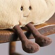 Close Up of Face and Legs on the Jellycat Amuseable Hot Dog Soft Toy