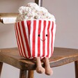 Jellycat Amuseable Popcorn Soft Toy Sitting on Wooden Chair