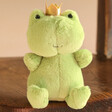 Jellycat Crowning Croaker Green Soft Toy on Wooden Chair