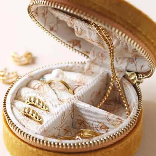 Floral Lining Inside Mustard Velvet Round Travel Jewellery Case Filled With Gold Jewellery