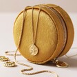 Mustard Velvet Round Travel Jewellery Case Surrounded by Gold Jewellery