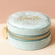 Mint Green Personalised Velvet Round Travel Jewellery Case in Front of Neutral Background