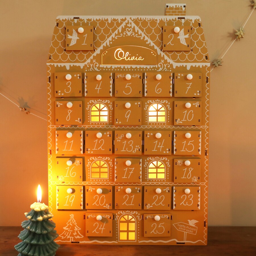 Gingerbread House Shaped Wooden Advent Calendar Lit Up