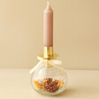 Dried Flower Filled Glass Candlestick Holder in Gold Holding Pink Candlestick