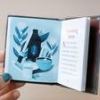 Model Showing Inside Page of Auras: An Introduction to Energy Fields Book with Blue Illustration