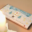 The Nutcracker Almond, Raisin and Orange Milk Chocolate Bar in Festive Lighting