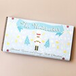 The Nutcracker Almond, Raisin and Orange Milk Chocolate Bar on Neutral Background