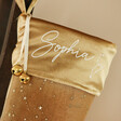 Close Up of Personalisation on the Gold on Personalised Constellation Starry Velvet Christmas Stocking 