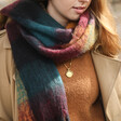 Close Up of Model Wearing Thick Burgundy, Navy and Mustard Winter Scarf