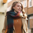 Thick Burgundy, Navy and Mustard Winter Scarf on Model Wearing Brown Coat