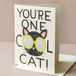 Cool Cat Birthday Card Sat Up on Top of Envelope with Natural Coloured Background
