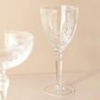 Crystal Cut Orchestra Wine Glass on Neutral Background