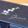 Close Up of Flower on Personalised Birth Flower Two Tier Jewellery Boxes in Navy on Neutral Background