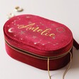 Red Personalised Starry Night Velvet Oval Jewellery Case on Neutral Background