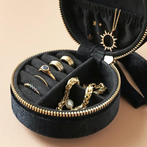 Close Up of Ring Rolls and Sections in Starry Night Velvet Mini Round Jewellery Case in Black