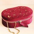 Starry Night Velvet Oval Jewellery Case in Red on Pink Surface