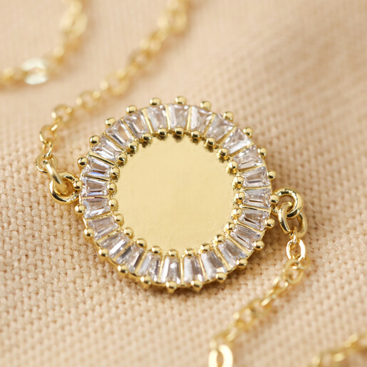 Close Up of Crystal Edge Disc Bracelet in Gold