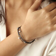 Model Wearing Grey Leather Layered Heart Bracelet in Silver