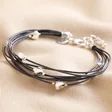 Grey Leather Layered Heart Bracelet in Silver on Neutral Fabric